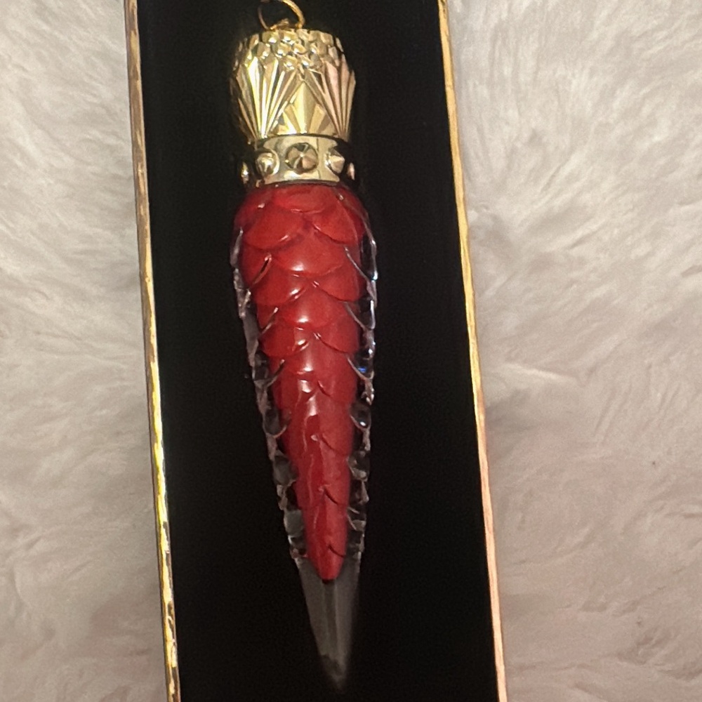 CL lip gloss with box brand new